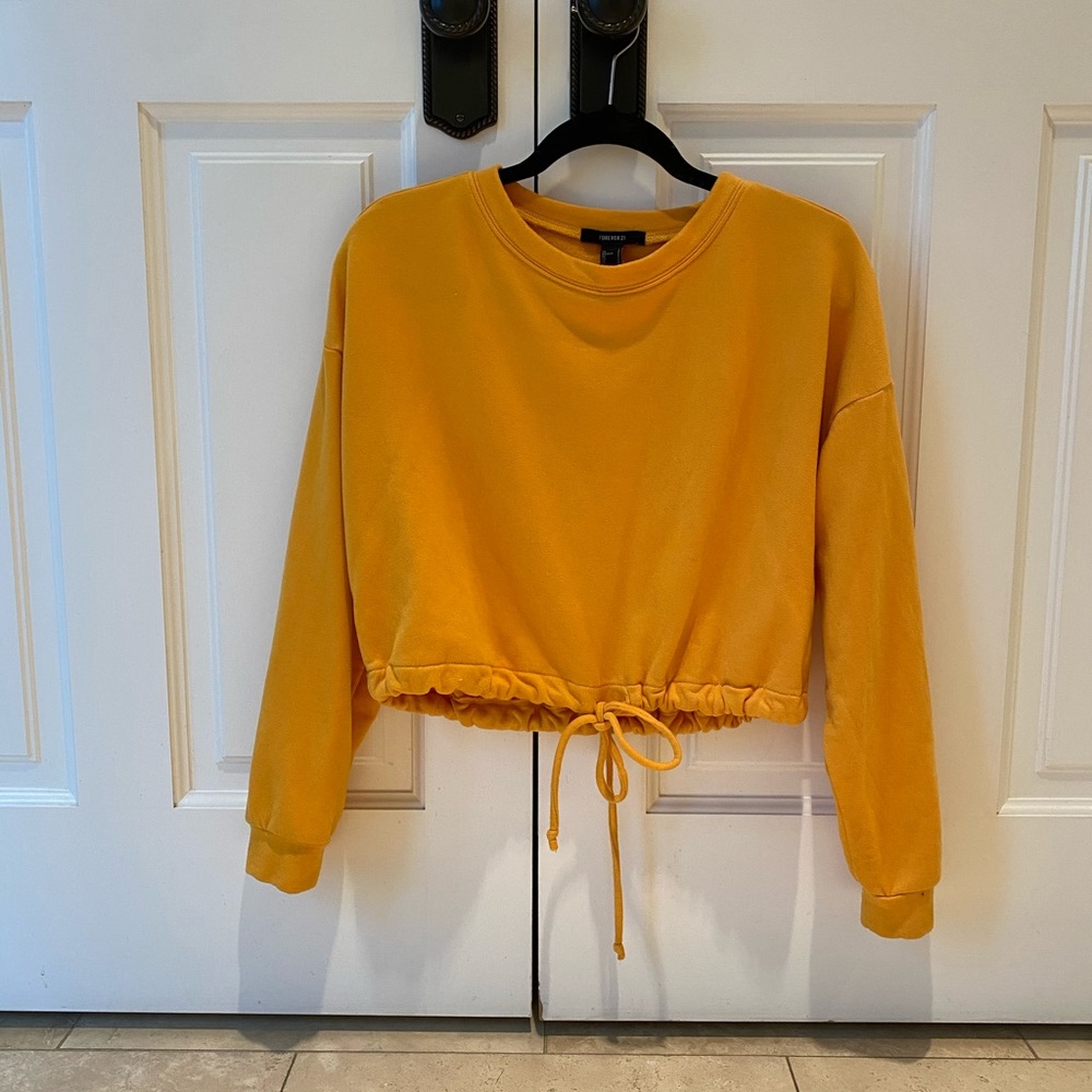 Cropped yellow drawstring sweatshirt